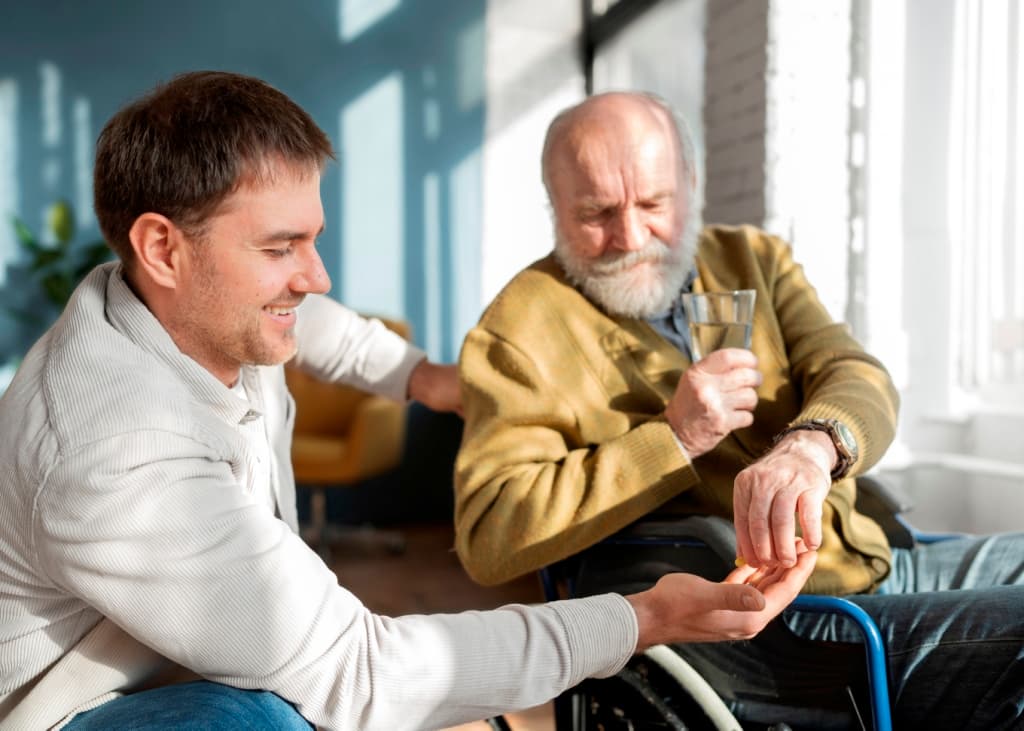 Home health aide assisting a person living with Parkinson's disease in NYC