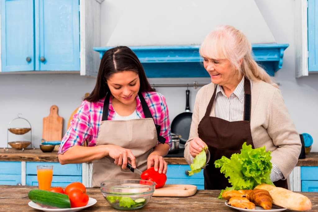 Home health aide helping with daily tasks and routines in New York City