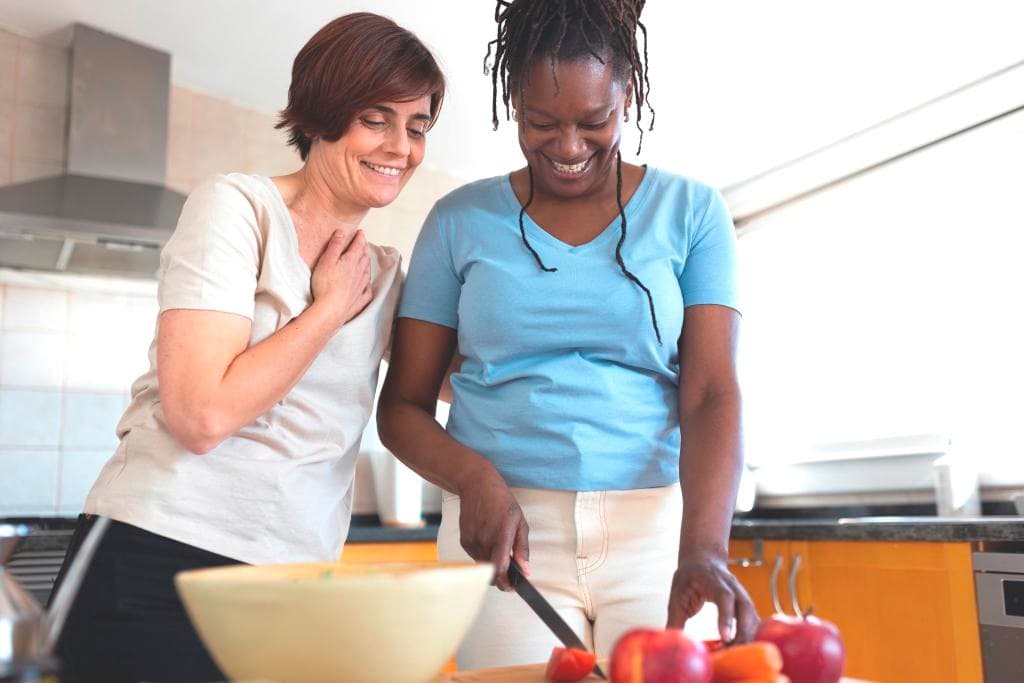Caregiver assisting with household tasks and independent living at home in NYC