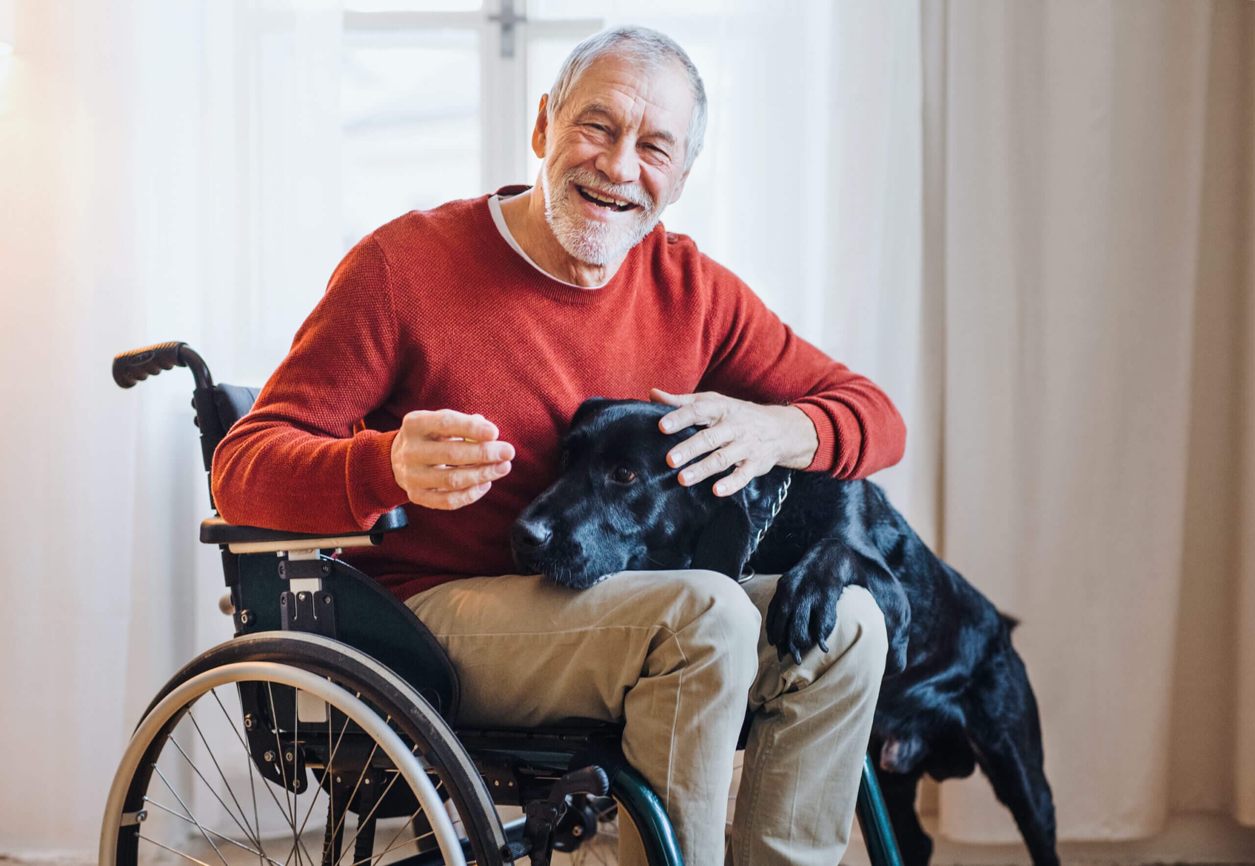 Caregiver providing wheelchair and bed-bound home care support in New York City